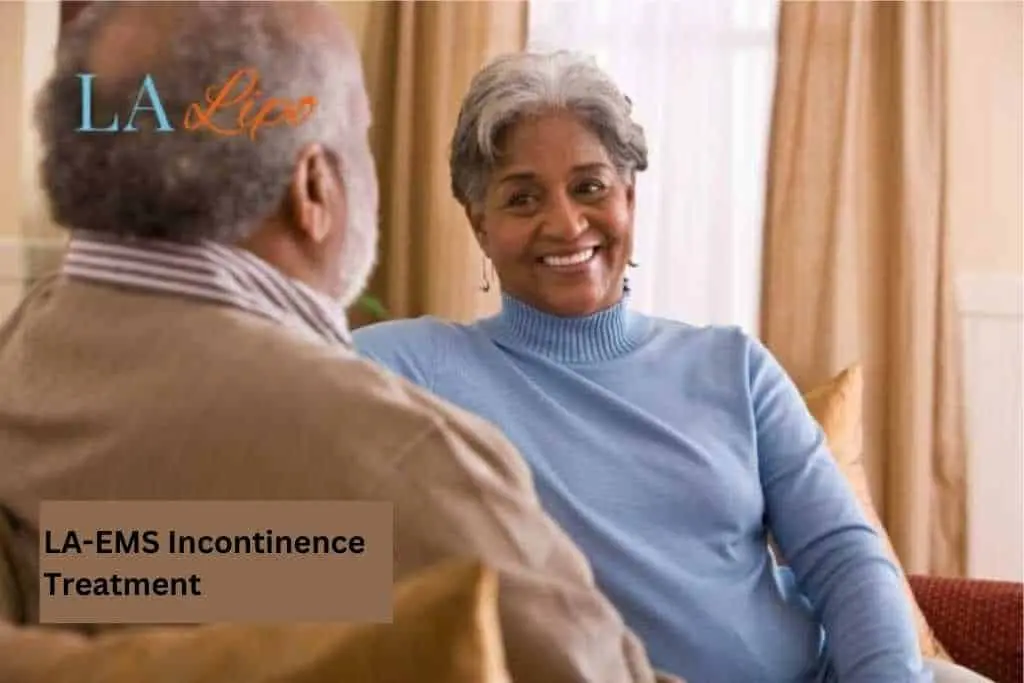 Couple sat smiling at each other - LA-EMS treatment Holland Park