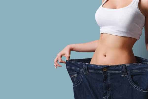 woman after fat reduction treatment Holland Park